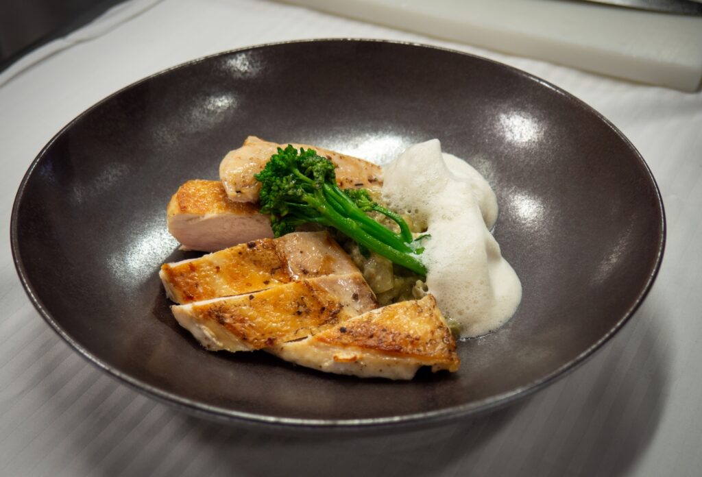 Browned Chicken Breast with Voatsiperifery Wild Pepper, Eggplant Marmalade with Comté Cheese and Toasted Bread Milk